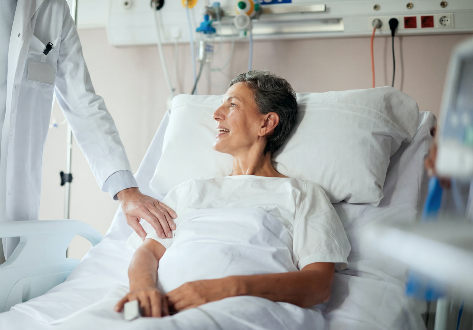 Care-focused moment between clinician and patient — the outcome every billing model ultimately has to protect: reliable access to care and clean revenue to fund it